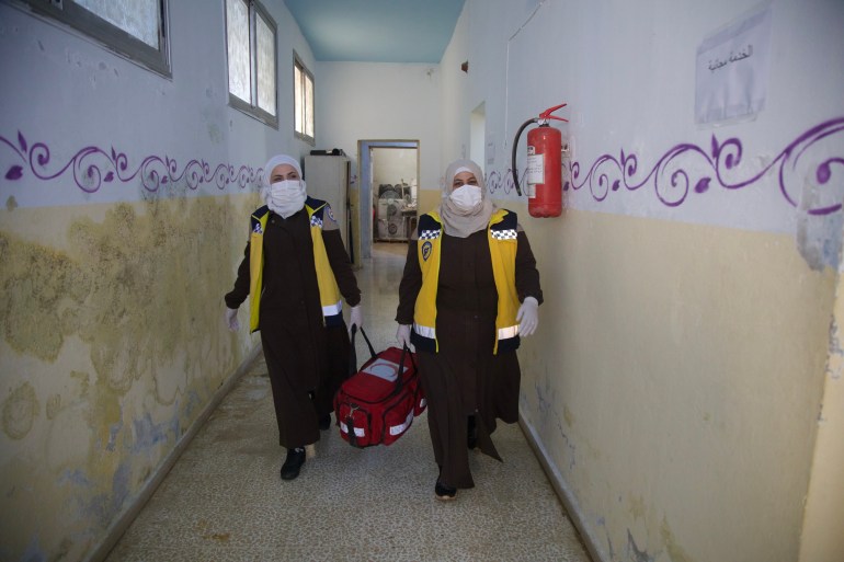 Shahd and her colleague head out with their medical bag to provide free medical care to survivors of the earthquakes