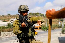 An Israeli soldier with a gun
