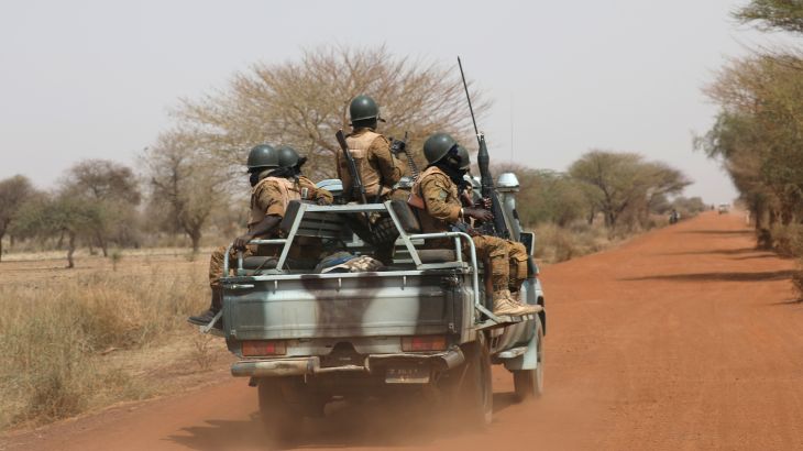 Soldiers from Burkina Faso patrol on the road of Gorgadji in sahel area, Burkina Faso