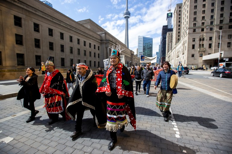 Wet'suwet'en hereditary chiefs march to RBC headquarters in Toronto, Canada