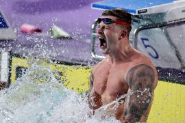 England's Adam Peaty celebrates after winning gold in the Commonwealth Games 50m breaststroke