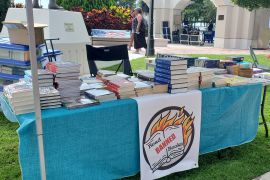 Foundation 451, which makes books banned in libraries available, has a table in Cocoa Riverfront Park in Florida