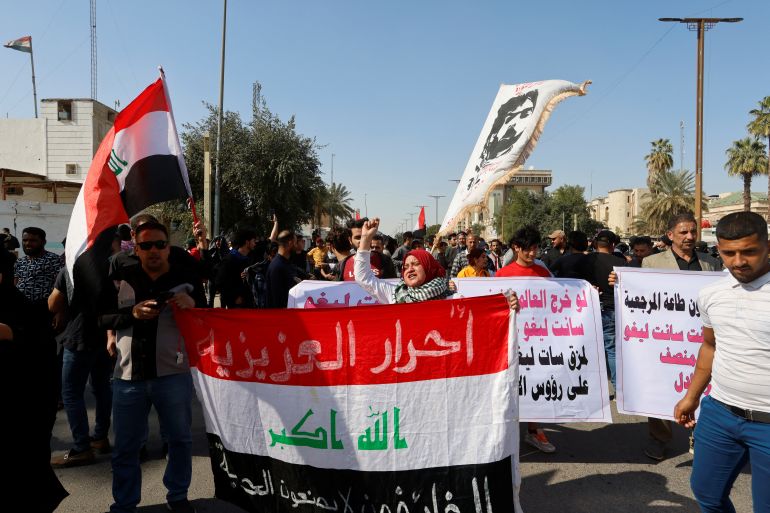 Demonstrators gather to protest against planned changes in electoral law, near Iraq's parliament in Baghdad, Iraq February 27, 2023. REUTERS/Ahmed Saad