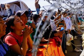 Asylum seekers protest at the US-Mexico border