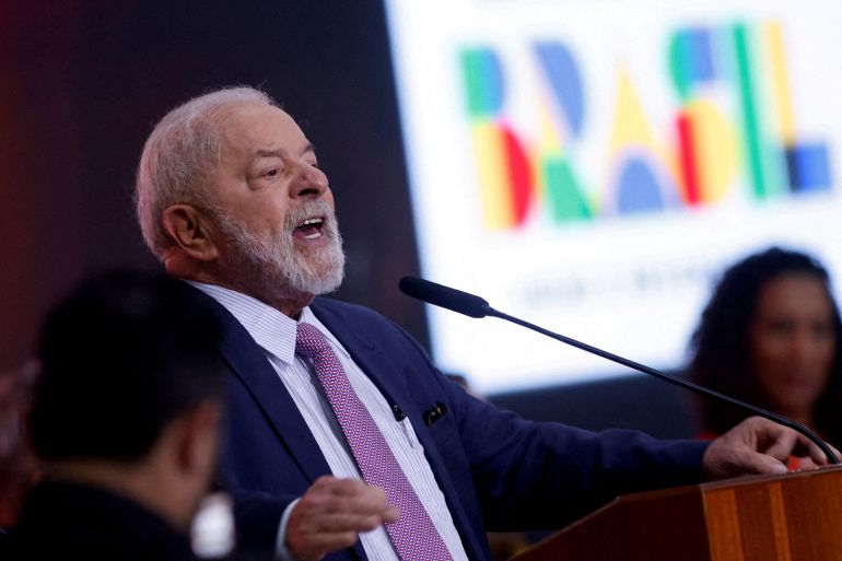 Brazilian President Luis Inacio Lula da Silva speaks at a microphone