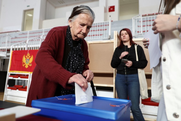 A person votes at a polling station during the run-off presidential election in Podgorica, Montenegro, April 2, 2023. 