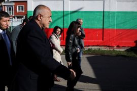 Boyko Borisov, former Bulgarian prime minister and leader of centre-right GERB party, leaves from a polling station during the parliamentary election in Sofia on April 2, 2023 [Reuters/Stoyan Nenov]