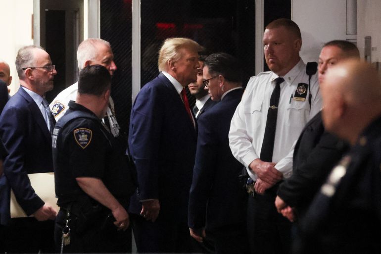 Former U.S. President Donald Trump arrives at Manhattan Criminal Courthouse, after his indictment by a Manhattan grand jury following a probe into hush money paid to porn star Stormy Daniels, in New York City, U.S., April 4, 2023