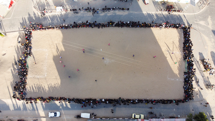 Aerial view of a sand football pitch