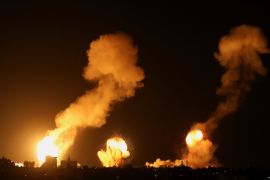 Smoke and flames rise during Israeli airstrikes in Khan Younis.