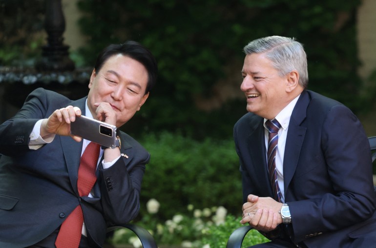 South Korean President Yoon Suk Yeol meets with Netflix co-CEO Ted Sarandos during a news conference in Washington, U.S., April 25, 2023.