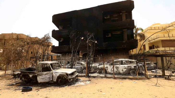 Damaged cars and buildings are seen at the central market during clashes between the paramilitary Rapid Support Forces and the army in Khartoum North, Sudan.