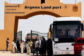 Passengers fleeing from Sudan arrive at the Argeen land port, after being evacuated from Khartoum to Abu Simbel city, at the upper reaches of the Nile in Aswan