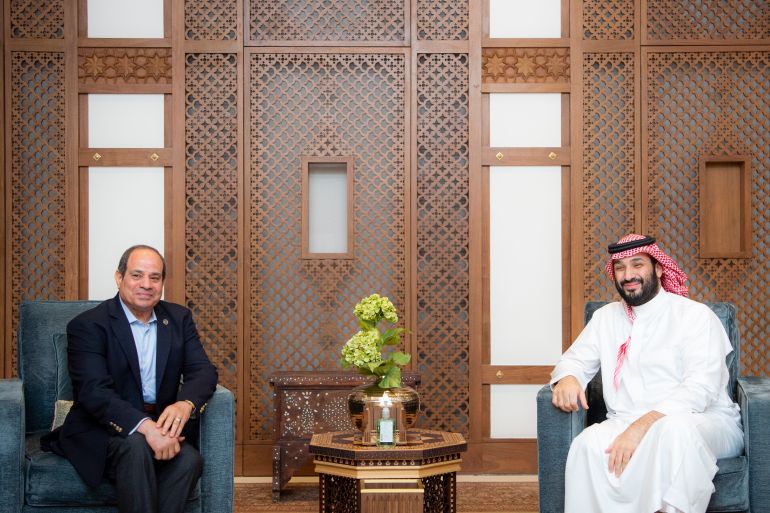 In this handout picture obtained from the Saudi Royal Palace, Crown Prince Mohammed bin Salman (R) meets Egypt's President Abdel Fattah al-Sisi in Jeddah