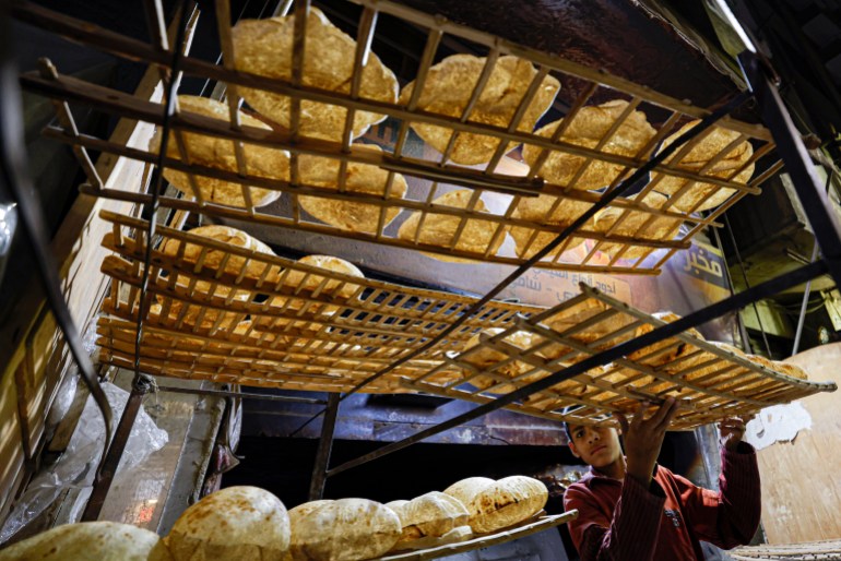trays of freshly-baked bread at a bakery