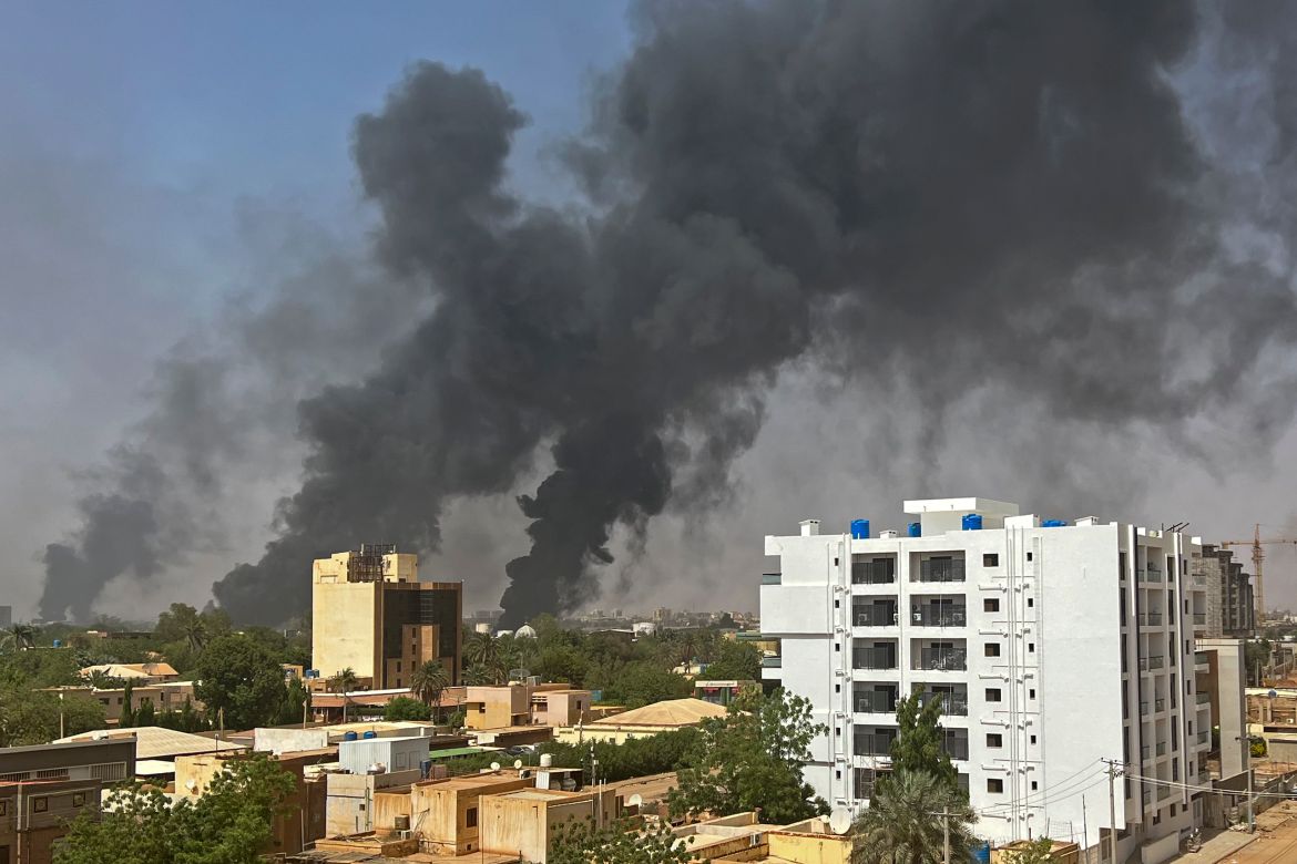 Smoke billows above buildings in Khartoum