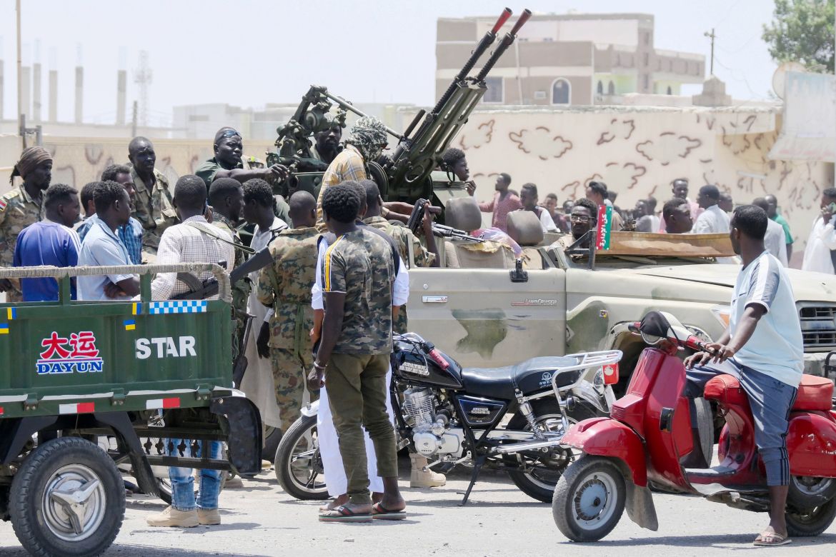 Sudanese greet army soldiers, loyal to army chief Abdel Fattah al-Burhan