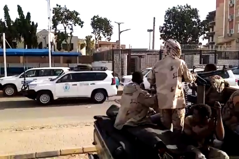 A grab taken from an AFPTV video shows a convoy leaving Khartoum towards Port Sudan, on April 23, 2023