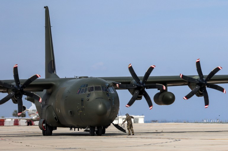 A British Royal Air Force C-130 Hercules military transport that was carrying evacuees from Sudan is pictured on the tarmac at Larnaca International Airport in Cyprus 
