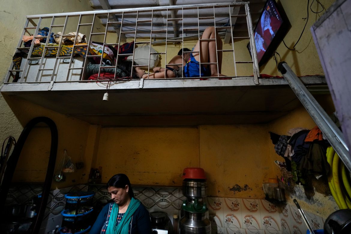 Sheela Singh, 39, inside her house in a shanty area in Mumbai