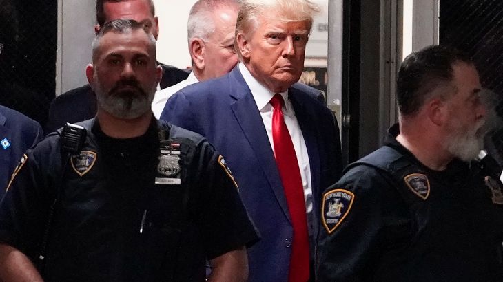 Former President Donald Trump arrives at court, Tuesday, April 4, 2023, in New York. Trump is set to appear in a New York City courtroom on charges related to falsifying business records in a hush money investigation, the first president ever to be charged with a crime. (AP Photo/Mary Altaffer)
