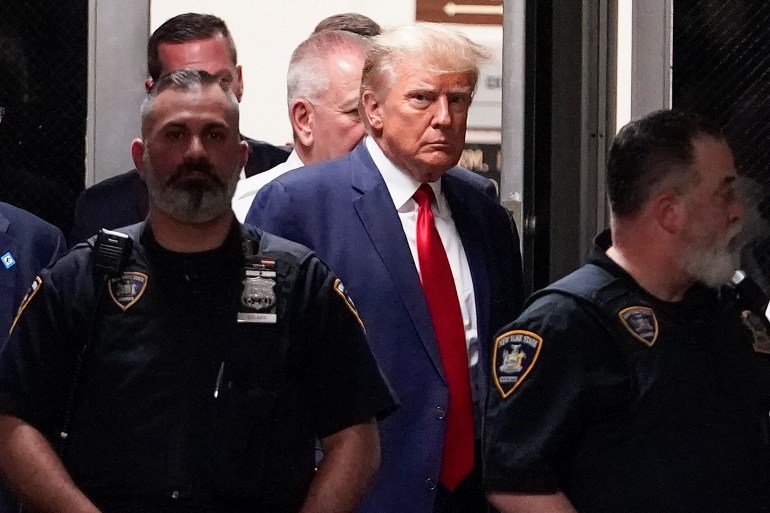 Former President Donald Trump arrives at court, Tuesday, April 4, 2023, in New York. Trump is set to appear in a New York City courtroom on charges related to falsifying business records in a hush money investigation, the first president ever to be charged with a crime. (AP Photo/Mary Altaffer)