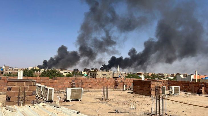 Smoke fills the sky in Khartoum, Sudan, near Doha International Hospital on Friday