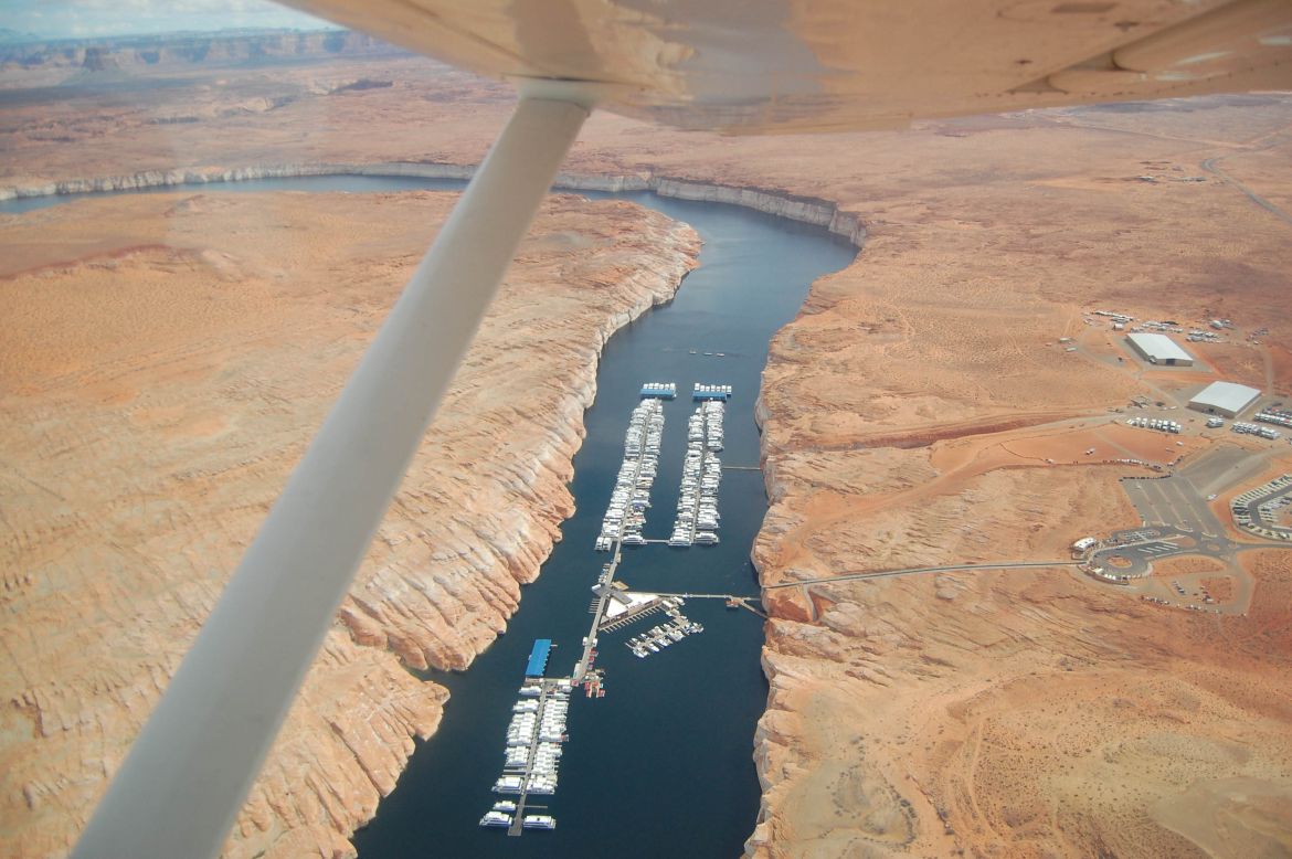 Built on the Colorado River and straddling the Arizona-Utah state border, the water in Lake Powell hit a new record low in February after years of climate change-fuelled aridification and reduced inflows from the Rocky Mountains, which feed the waterway