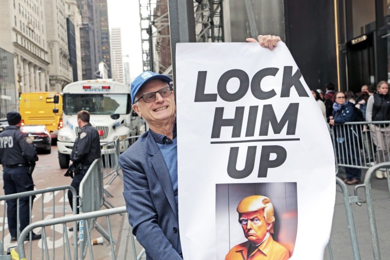 Bob Fertik, 65, an anti-Trump supporter and president of progressive blog, Democrats.com, said he trekked to Trump Tower to catch a glimpse of the “scary protesters.” [Dorian Geiger/Al Jazeera]
