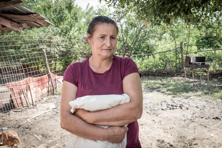 Petra lives in a small village in the province of Iaşi in Romania. She is 47 years old and has 9 children and 13 grandchildren. She worked in Italy fields for three summers. A child of hers was ill, and she needed money to buy medicine for him.