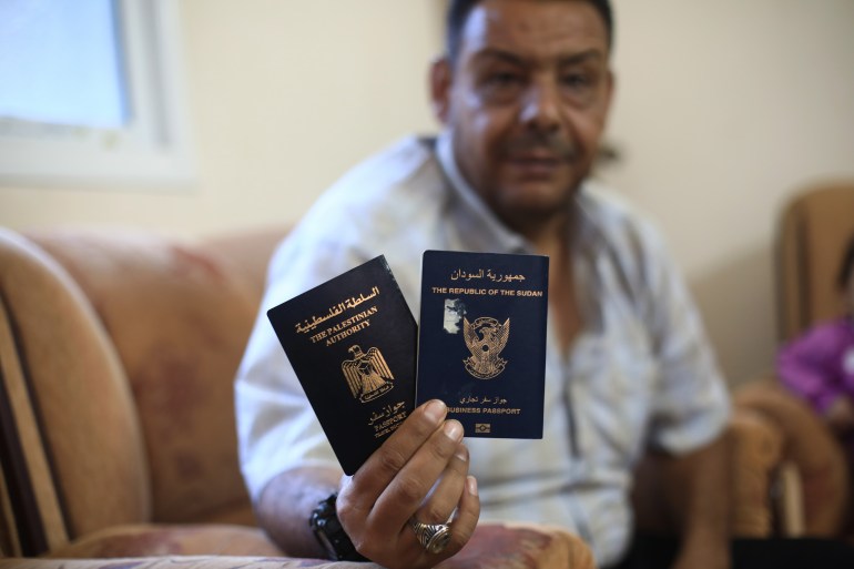 A man holds passports