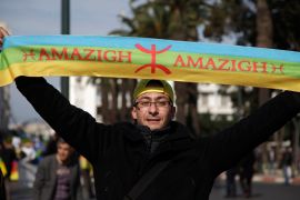 A local Amazigh man attends a rally in celebration of the Amazigh New Year, and also to express solidarity with Libyan Amazigh people, in Rabat January 15, 2012. In addition to demanding a greater say in Libya's new political order, the Amazigh, or Berber, ethnic minority are seeking recognition of their language and culture. REUTERS/Stringer (MOROCCO - Tags: CIVIL UNREST POLITICS SOCIETY)