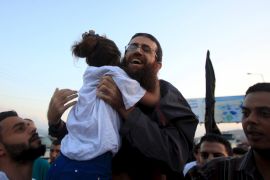 IKhader Adnan is hugged by his daughter upon his release from an Israeli jail, in the West Bank village of Arabeh near Jenin July 12, 2015.