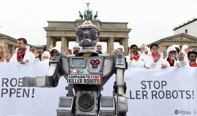 Activists from the Campaign to Stop Killer Robots, a coalition of nongovernmental organisations opposing lethal autonomous weapons or so-called 'killer robots', stage a protest at the Brandenburg Gate in Berlin, Germany, March, 21, 2019. 