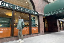 A man walks past a branch of First Republic Bank in San Francisco, California.
