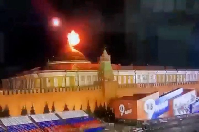 A still image taken from video shows a flying object exploding in an intense burst of light near the dome of the Kremlin Senate building during the alleged Ukrainian drone attack in Moscow, Russia, in this image taken from video obtained by Reuters May 3, 2023. Ostorozhno Novosti/Handout via REUTERS ATTENTION EDITORS - THIS IMAGE WAS PROVIDED BY A THIRD PARTY. NO RESALES. NO ARCHIVES. MANDATORY CREDIT. 