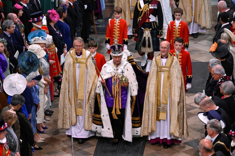 King Charles III departs the coronation service.