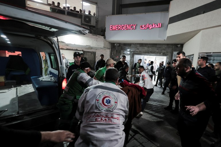 Medics transport a victim to Shifa Hospital following Israeli airstrikes in Gaza May 9, 2023. REUTERS/Ahmed Zakot NO RESALES. NO ARCHIVES