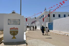 FILE PHOTO: Jewish worshippers arrive at the Ghriba synagogue, during an annual pilgrimage in Djerba, Tunisia May 18, 2022. Picture taken May 18, 2022. REUTERS/Jihed Abidellaoui/File Photo