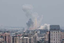 Smoke rises following an Israeli strike, in Gaza
