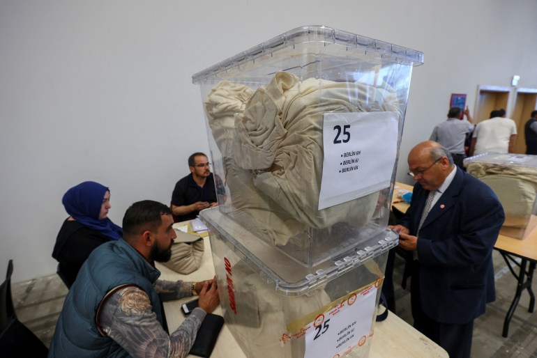 Election officials wait to count votes from abroad on the day of Turkey's presidential and parliamentary elections, in Ankara, Turkey.