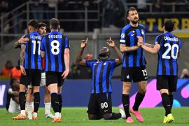 Inter Milan's Romelu Lukaku, Francesco Acerbi, Hakan Calhanoglu and Robin Gosens celebrate after the match.