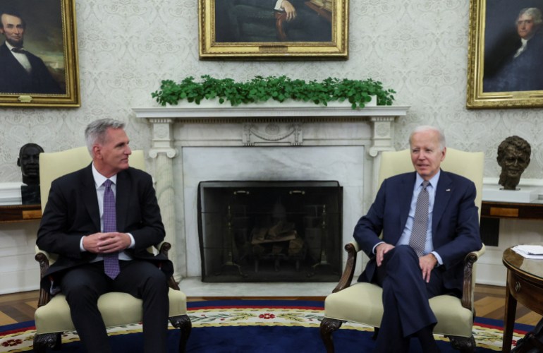 US President Joe Biden hosts debt-limit talks with House Speaker Kevin McCarthy in the Oval Office.
