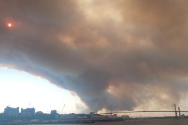 Smoke rises from a wildfire in Halifax, Nova Scotia, Canada