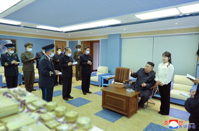 This picture taken on April 18, 2023 and released from North Korea's official Korean Central News Agency (KCNA) on April 19, 2023 shows North Korean leader Kim Jong Un (2nd R) and his daughter, presumed to be named Ju Ae (R), inspecting the National Aerospace Development Administration (NADA) at an undisclosed place in North Korea. (Photo by STR / KCNA VIA KNS / AFP) / South Korea OUT / SOUTH KOREA OUT / ---EDITORS NOTE--- RESTRICTED TO EDITORIAL USE - MANDATORY CREDIT "AFP PHOTO/KCNA VIA KNS" - NO MARKETING NO ADVERTISING CAMPAIGNS - DISTRIBUTED AS A SERVICE TO CLIENTS / THIS PICTURE WAS MADE AVAILABLE BY A THIRD PARTY. AFP CAN NOT INDEPENDENTLY VERIFY THE AUTHENTICITY, LOCATION, DATE AND CONTENT OF THIS IMAGE --- - ---EDITORS NOTE--- RESTRICTED TO EDITORIAL USE - MANDATORY CREDIT "AFP PHOTO/KCNA VIA KNS" - NO MARKETING NO ADVERTISING CAMPAIGNS - DISTRIBUTED AS A SERVICE TO CLIENTS / THIS PICTURE WAS MADE AVAILABLE BY A THIRD PARTY. AFP CAN NOT INDEPENDENTLY VERIFY THE AUTHENTICITY, LOCATION, DATE AND CONTENT OF THIS IMAGE --- /