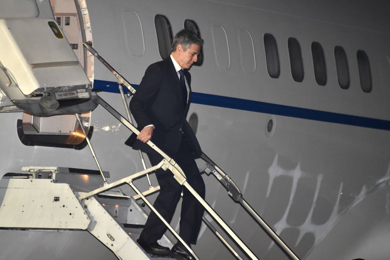 US Secretary of State Antony Blinken walking down the steps from his plane after arriving in Papua New Guinea.