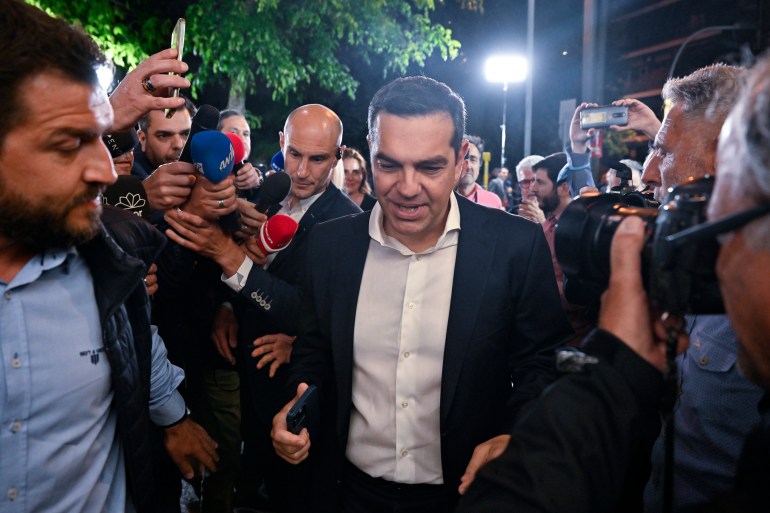 Alexis Tsipras arrives at Syriza's headquarters in Athens, Greece.