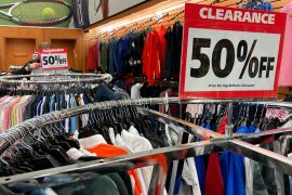 Clearance sale signs are displayed at a retail store in Downers Grove, Illinois, US
