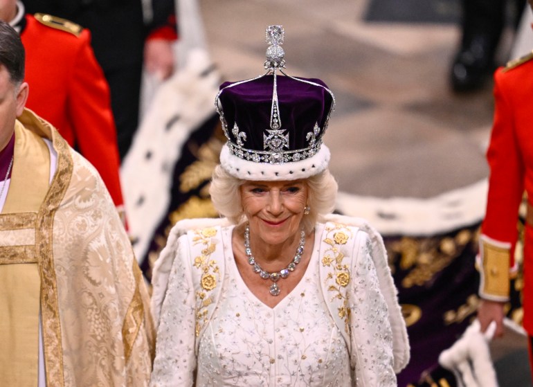 Britain's Queen Camilla leaves Westminster Abbey after the coronation of King Charles III in London, Saturday, May 6, 2023. (