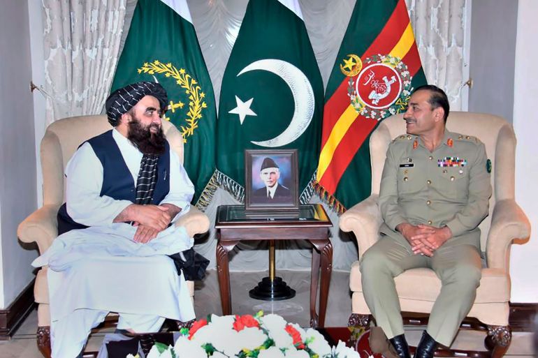 the Taliban-appointed Afghan Foreign Minister Amir Khan Muttaqi, left, meets with Pakistan's Army Chief General Asim Munir, in Rawalpindi,